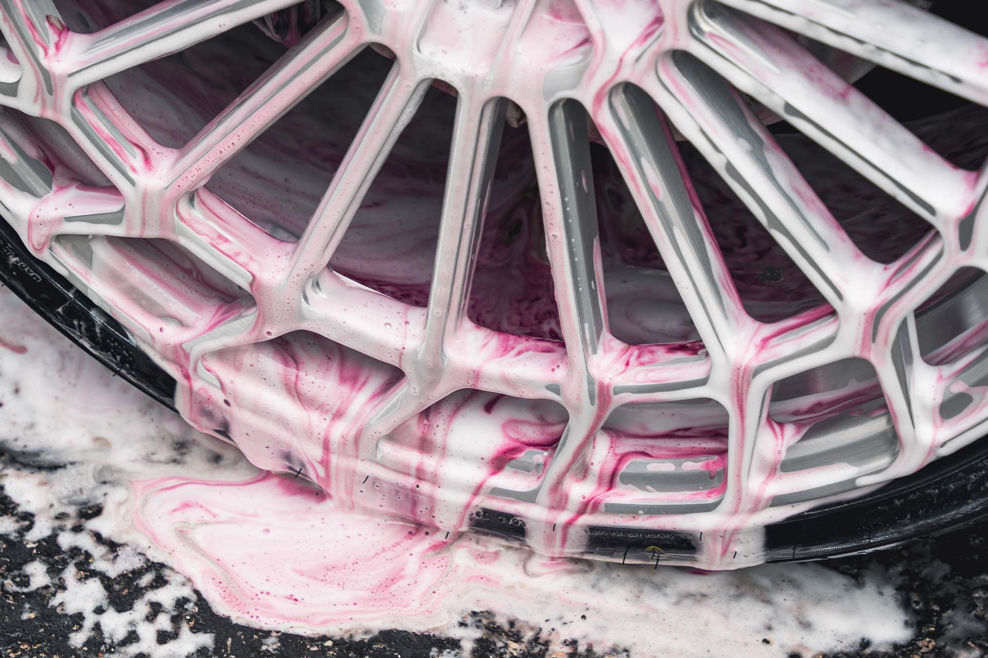 forged aluminum wheel reacting to iron remover chemical bleeding purple