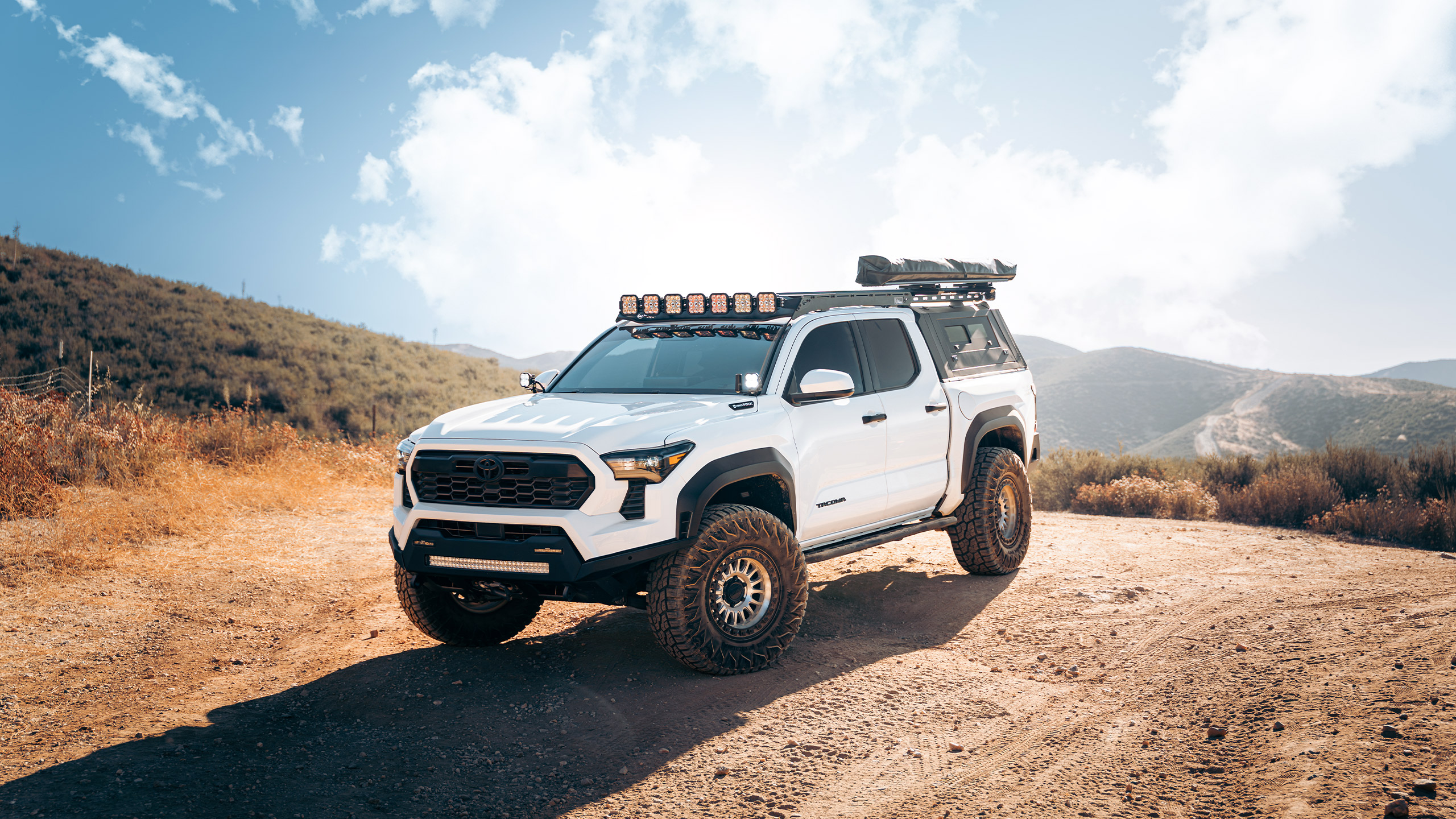 gen 4 white toyota tacoma hero
