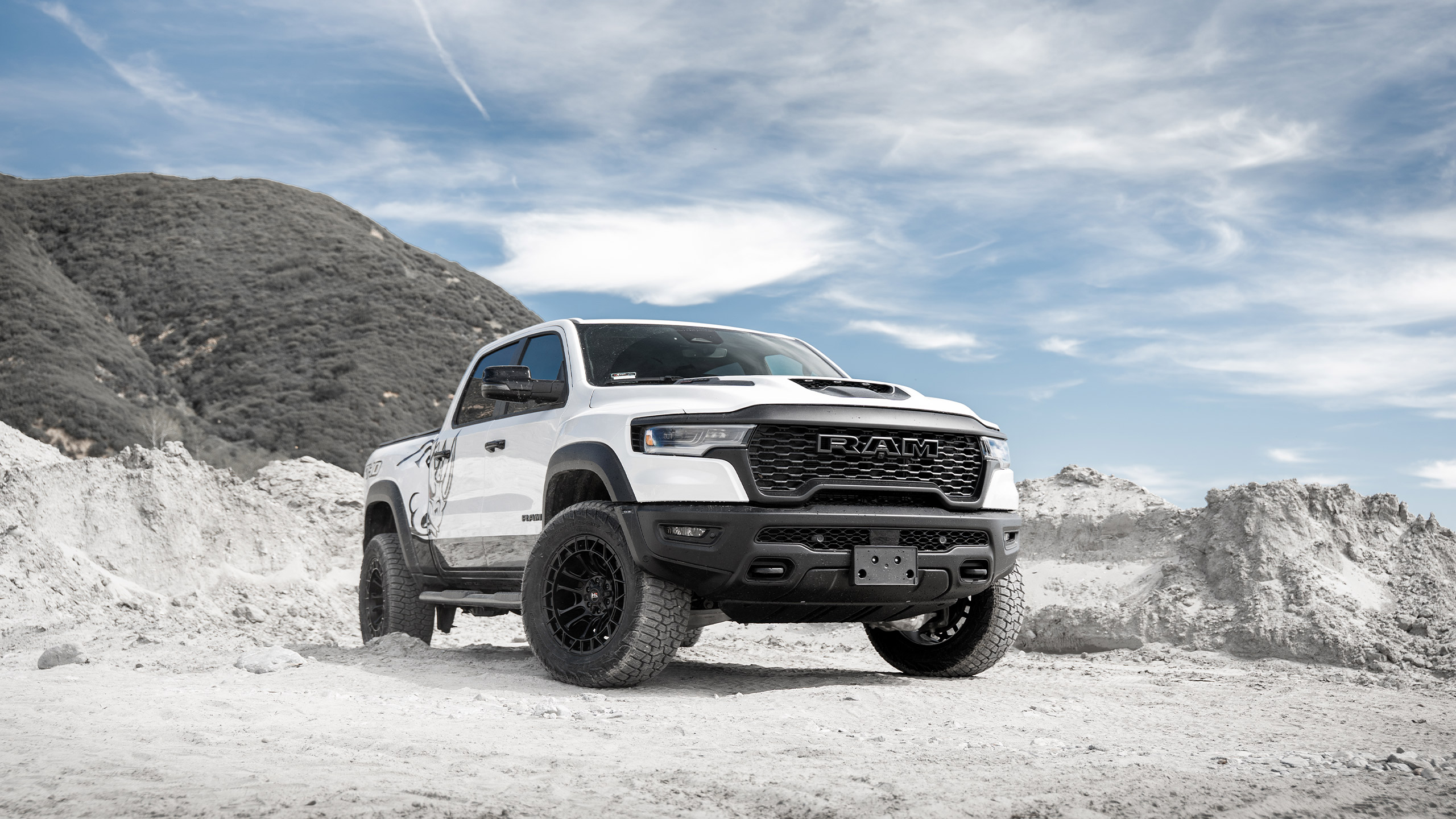 white ram 1500 rho in desert landscape
