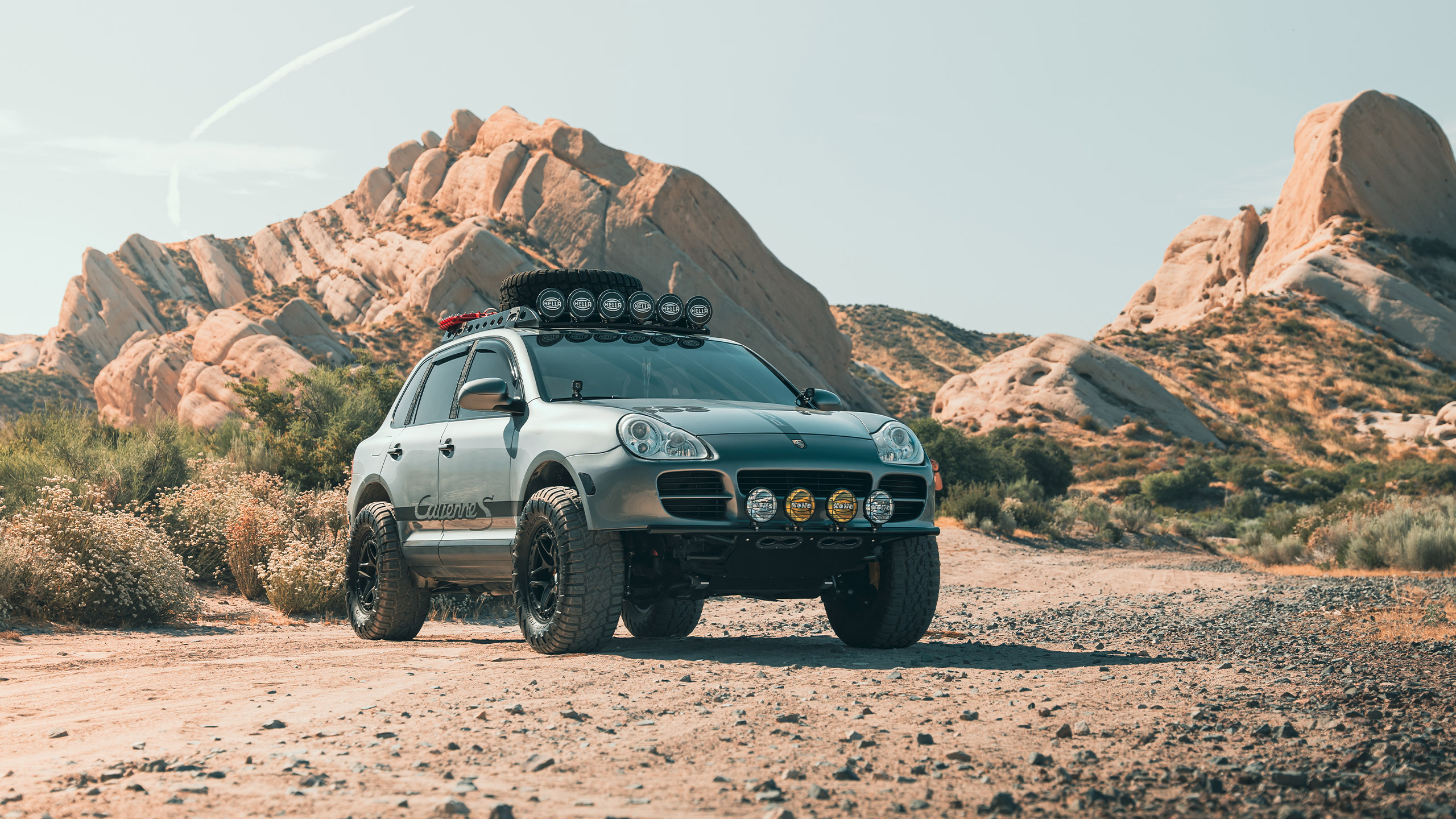silver porsche cayenne s overland hero