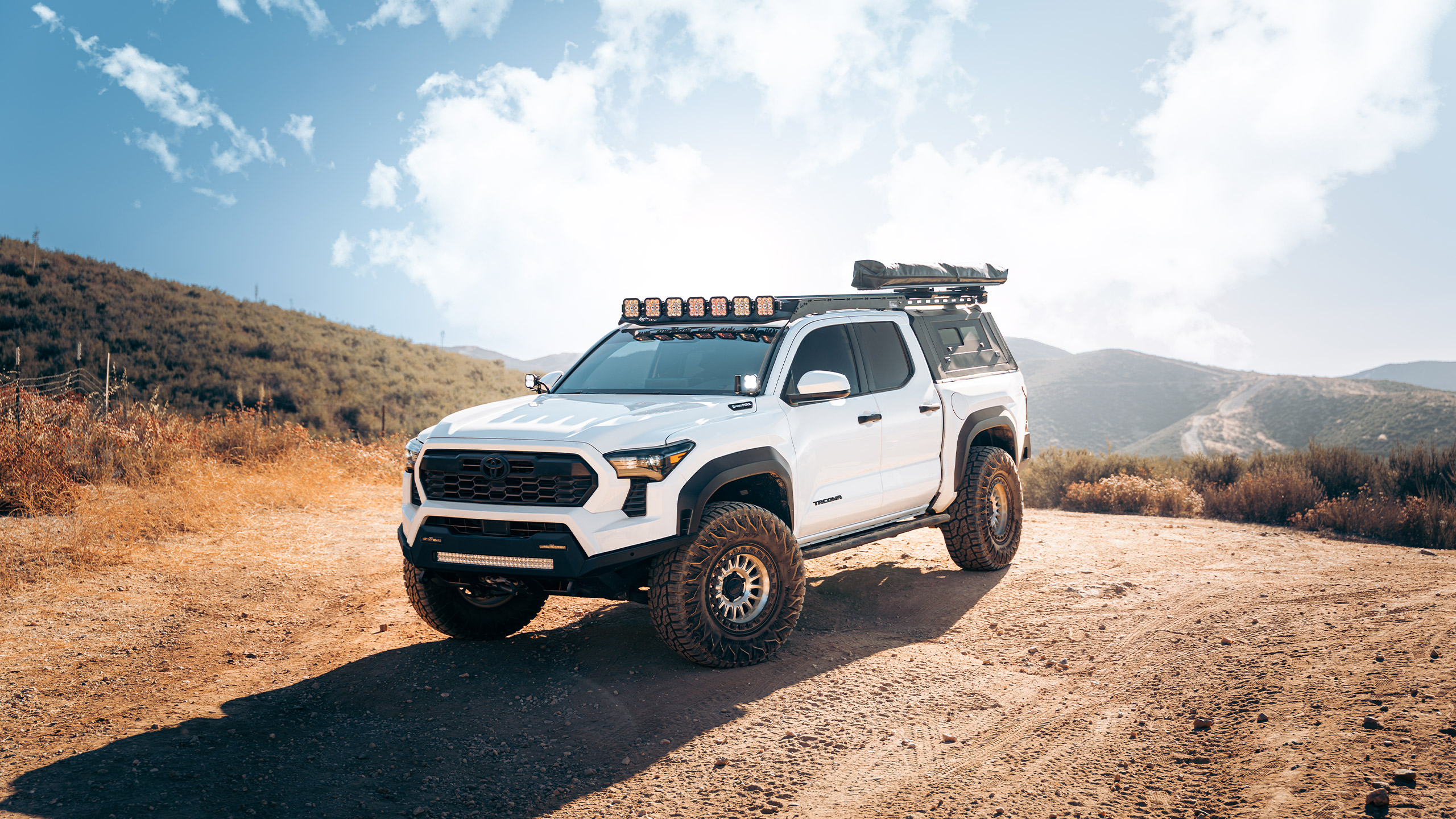 overland built toyota tacoma on trail